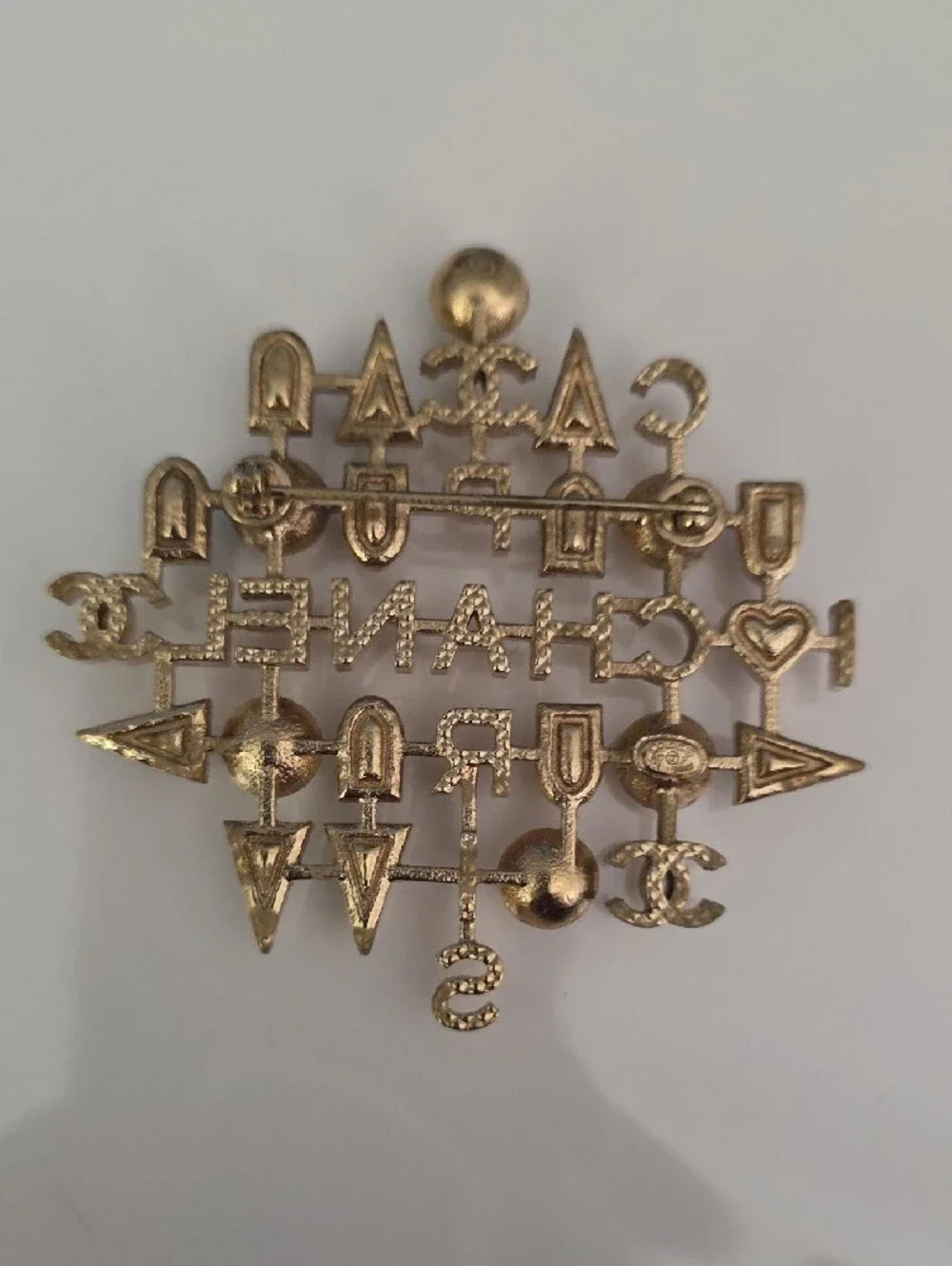 CHANEL Gold-Tone Multicolor Enamel & Pearl Logo Brooch